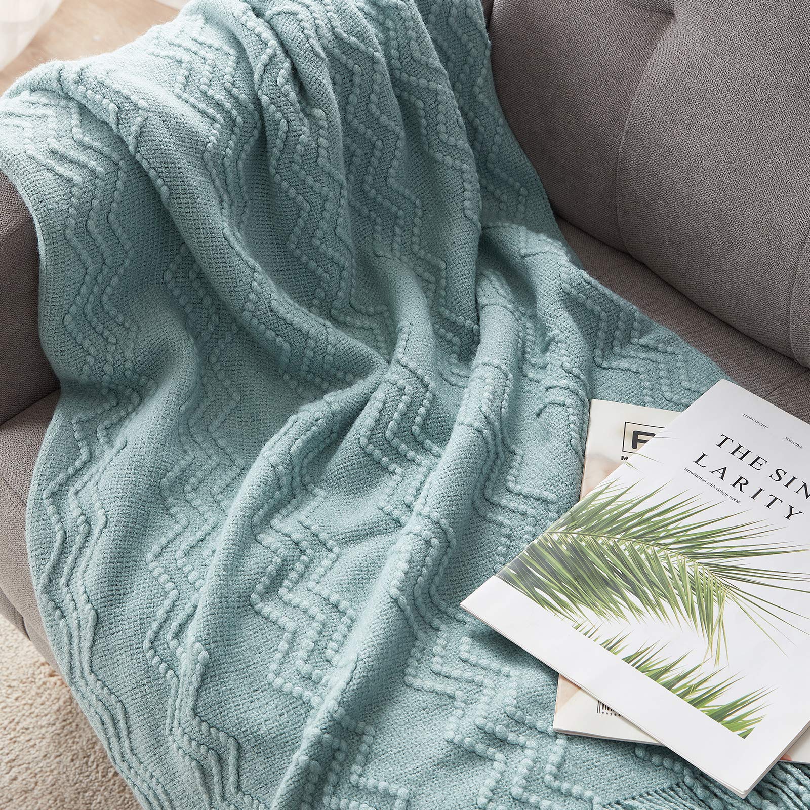 BOURINA Aqua Throw Blanket rolled fringed edges provide a refined finish