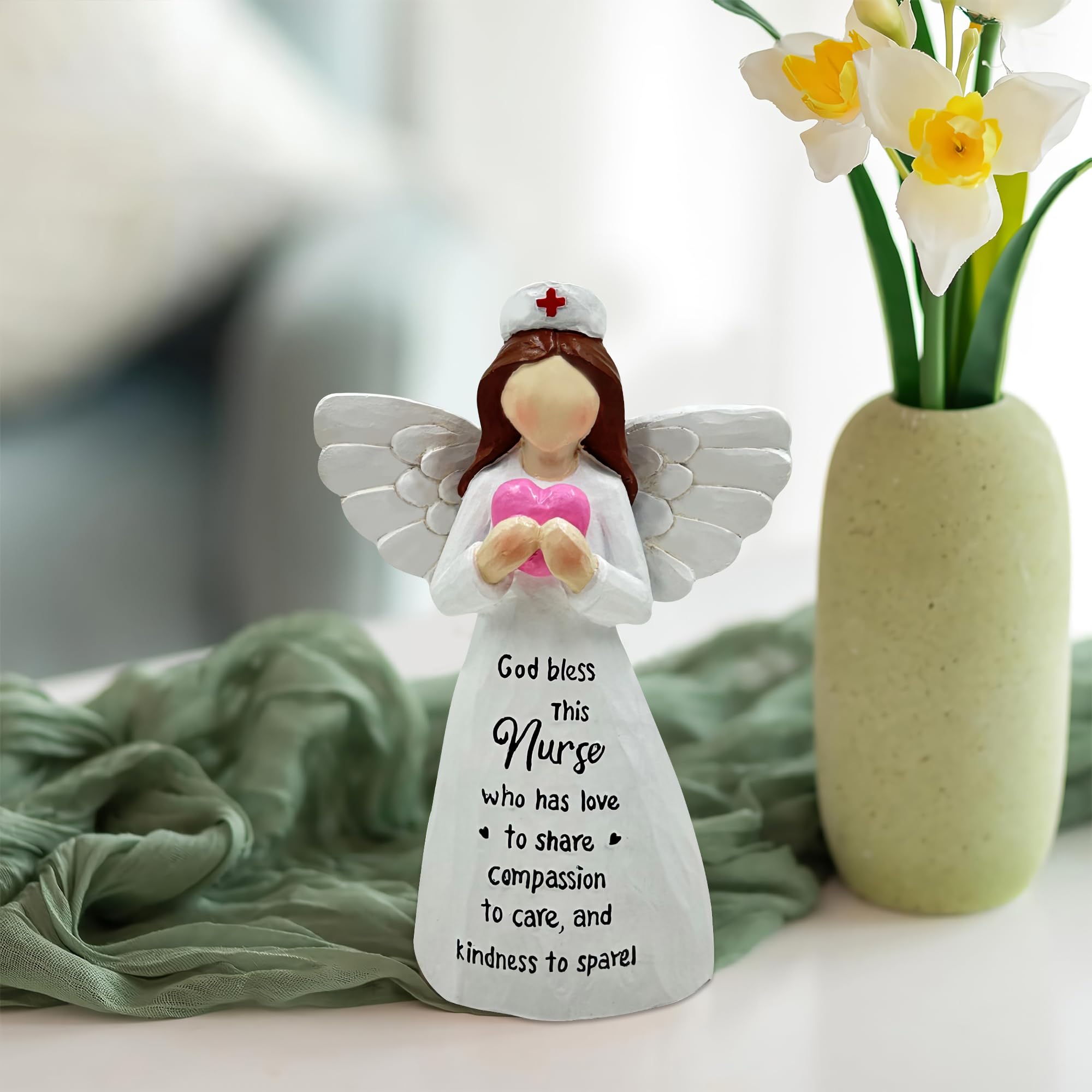 Bozspacer nurse angle figurine graduation theme celebrating medical graduates.