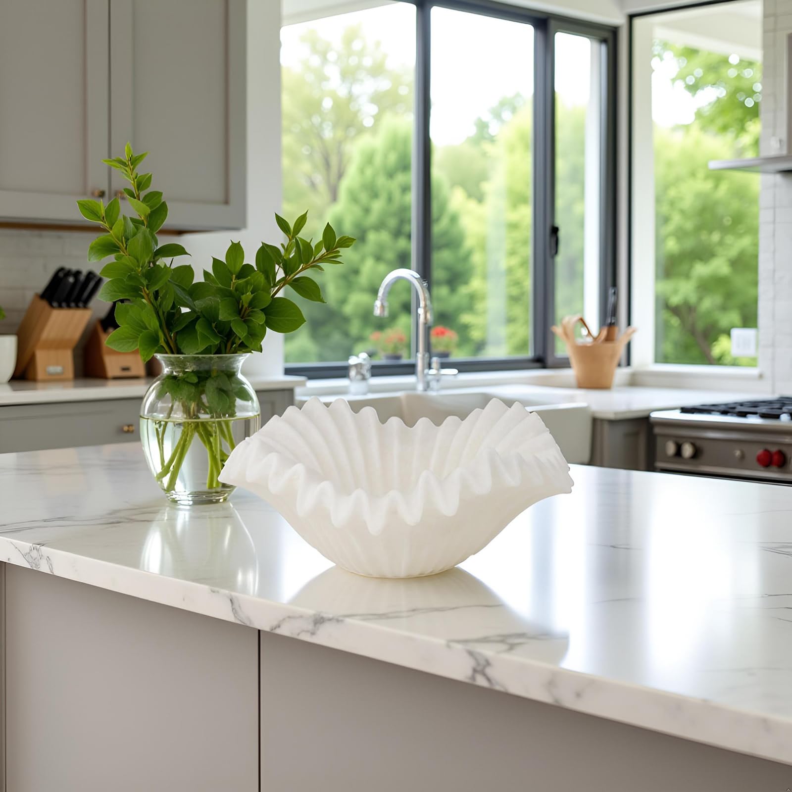 Braxio resin bowl with fluted edges complements modern decor.