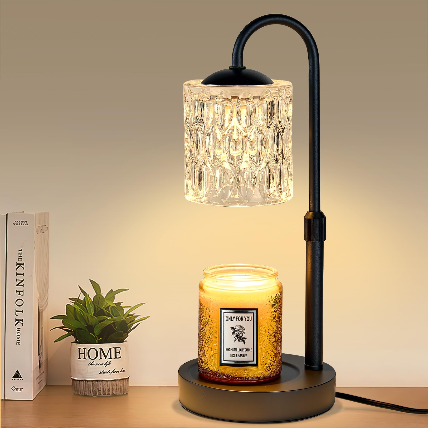 Briever candle warmer with base and glass shade enables smokeless fragrance diffusion.