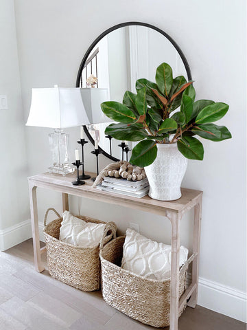 Briful artificial magnolia leaves add sophisticated greenery to shelves and mantels.