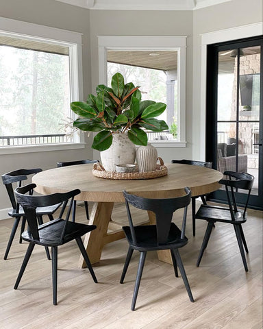 Briful magnolia stems in vases create year-round decor accents.