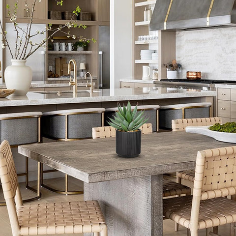 Briful artificial succulents bring natural texture to office desks.