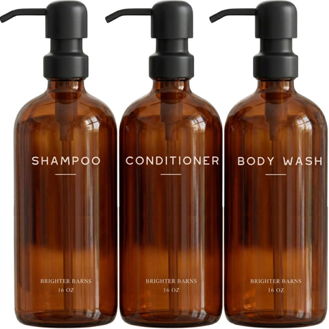 Brighter Barns amber shampoo dispenser set bottles with pumps for organized bathroom storage.