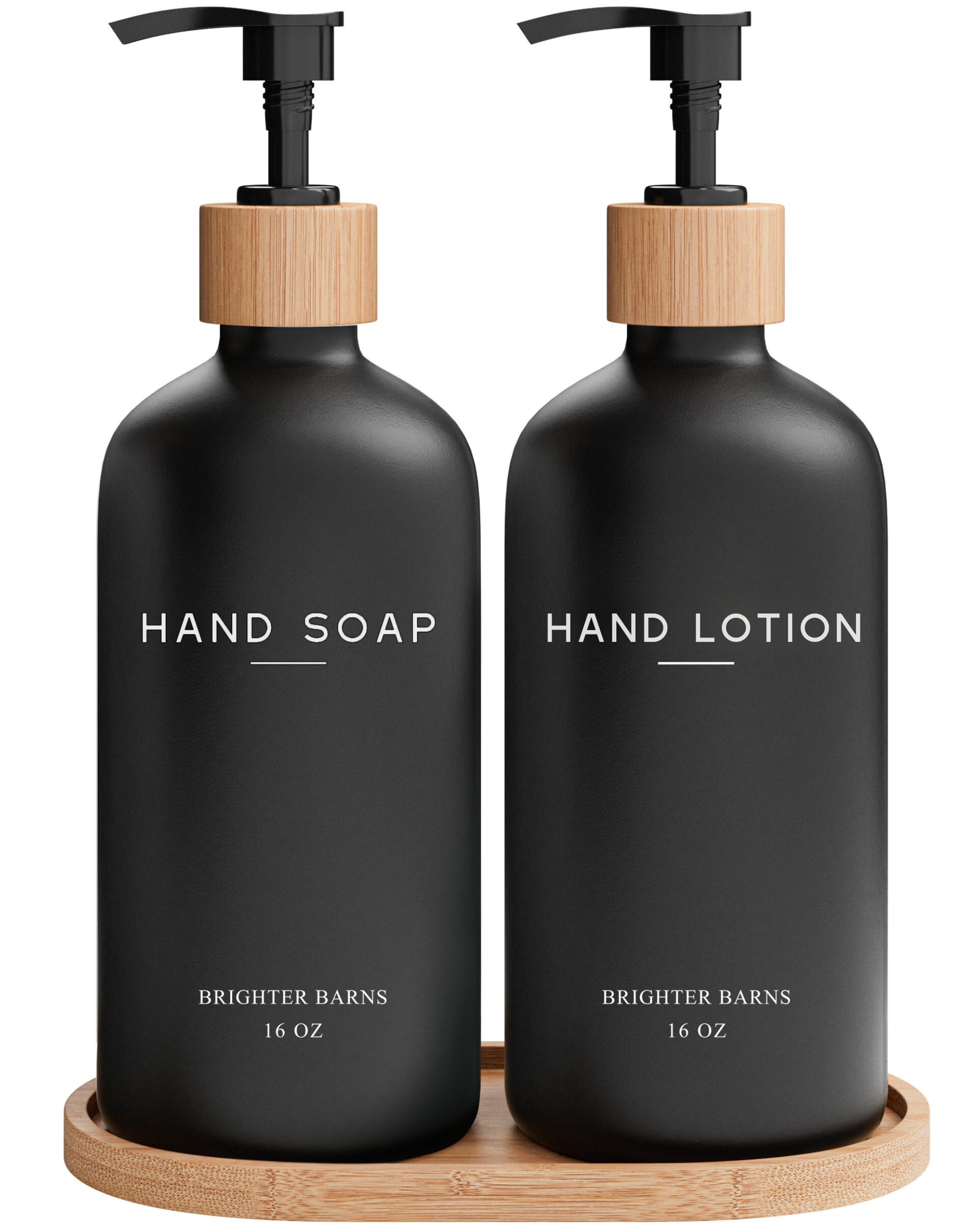 Brighter Barns black glass dispenser set with two bottles, for a sleek bathroom display.
