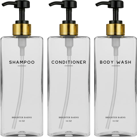 Brighter Barns Clear Shampoo Dispenser Set on a minimalist bathroom shelf for chic, organized storage.