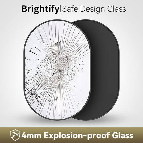 Brightify matte black oval mirror complements modern living room decor