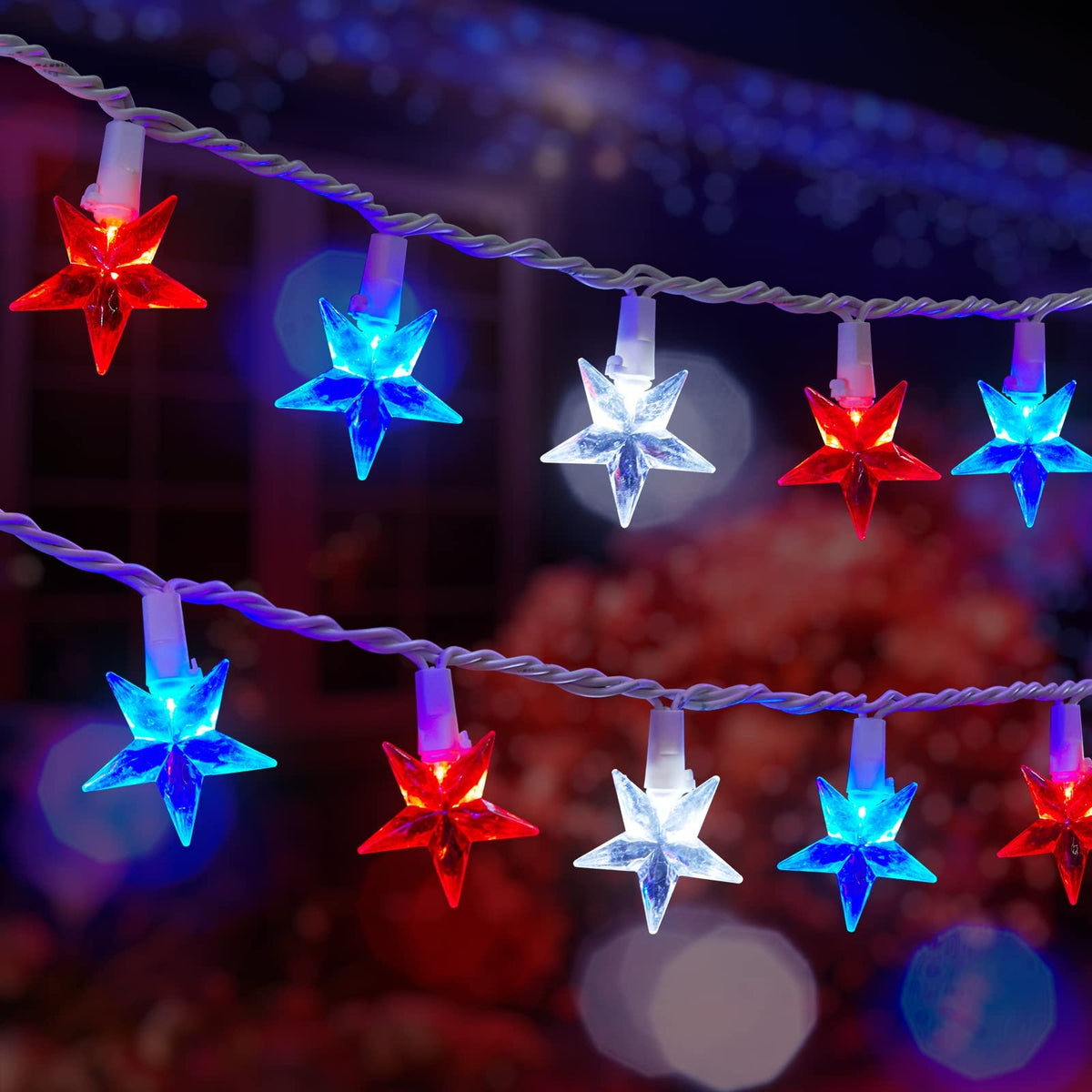 Brightown red white blue star string lights 33ft with 100 LEDs for festive outdoor decor.