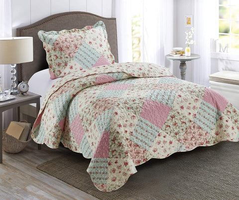 Brilliant Sunshine pink-green patchwork quilt set front view on a twin bed for cozy styling.
