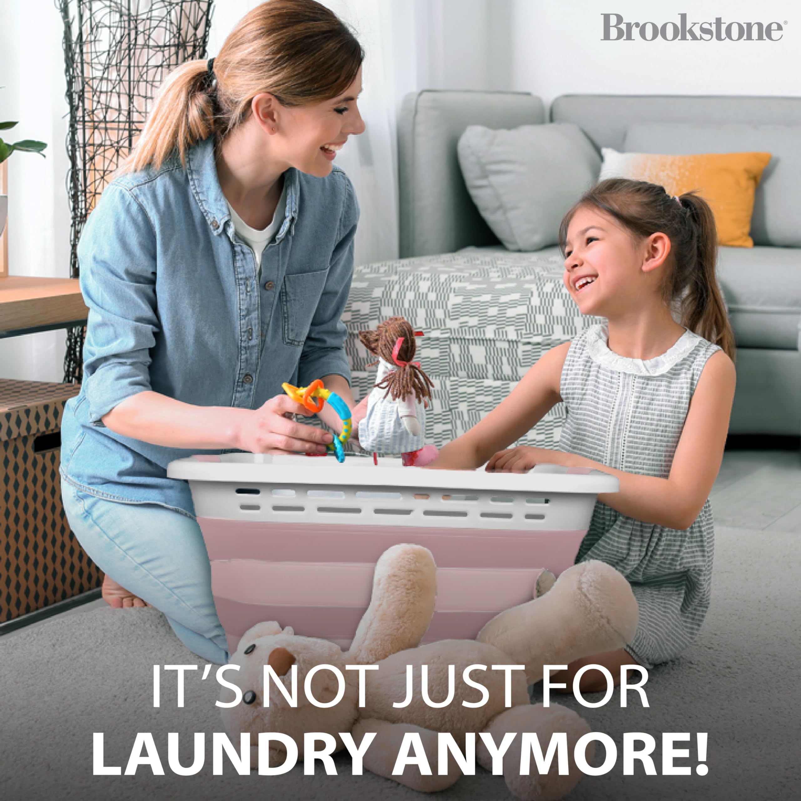 Brookstone blush pink laundry basket adds organized style to bedrooms or utility spaces.