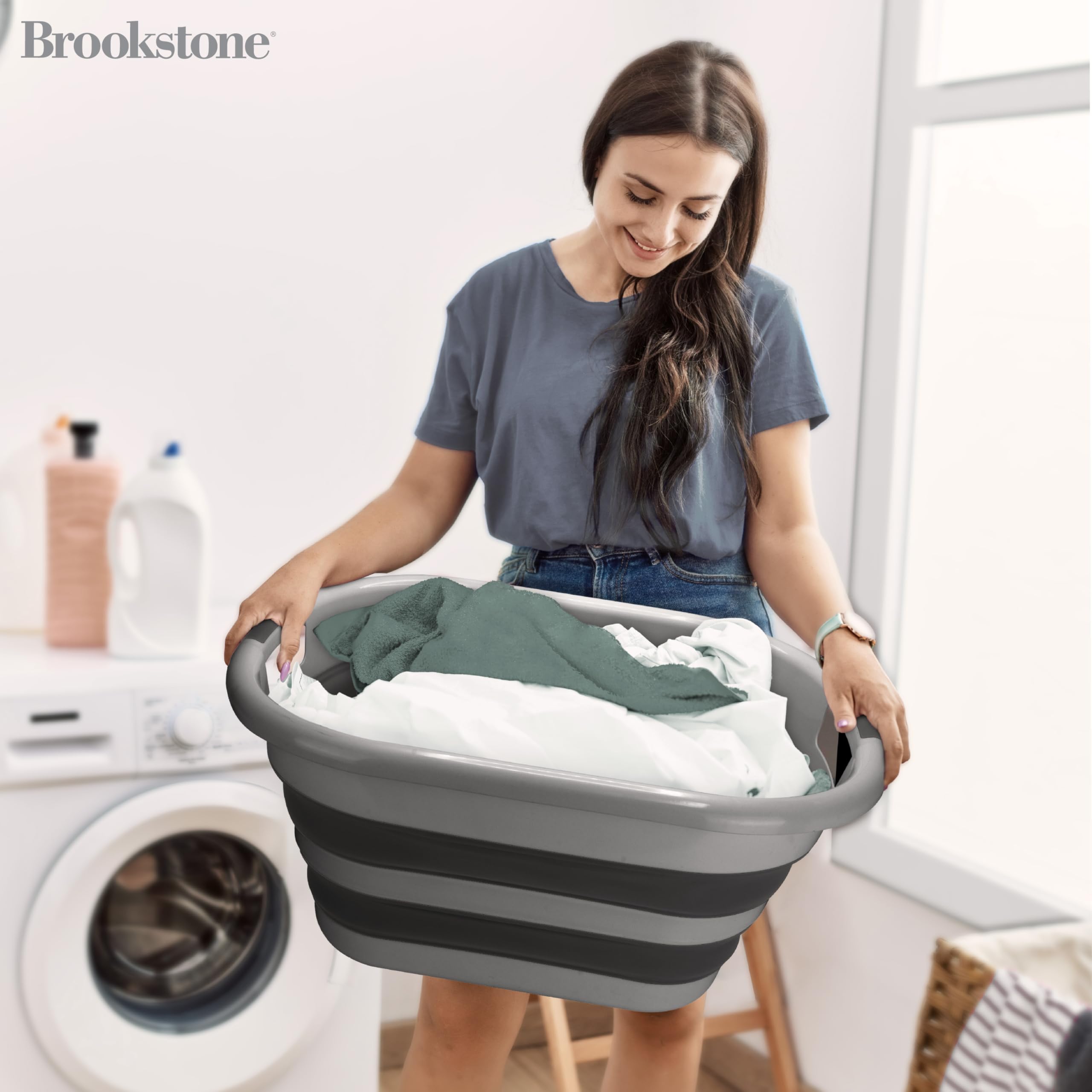 Brookstone collapsible basket with comfortable handles for effortless carrying.