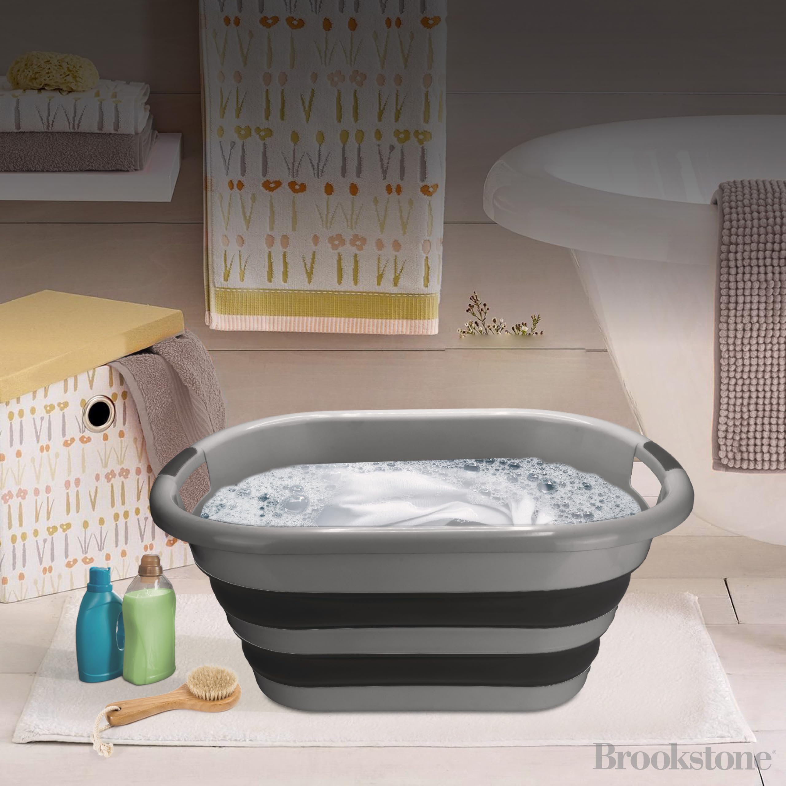 Brookstone dark grey collapsible basket designed for versatile home use.