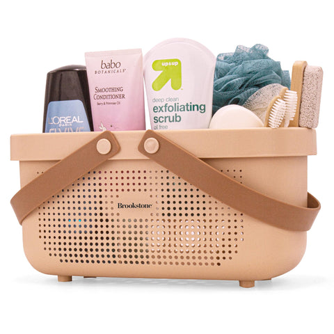 Brookstone shower caddy with soft silicone handle for easy carrying and luxury feel.