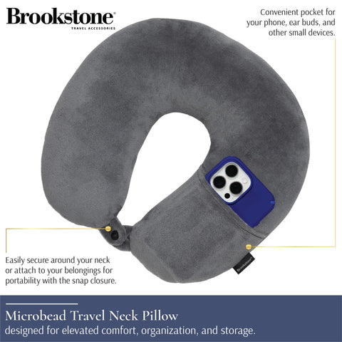 Brookstone travel pillow shows a dual-sided design for warm or cool comfort