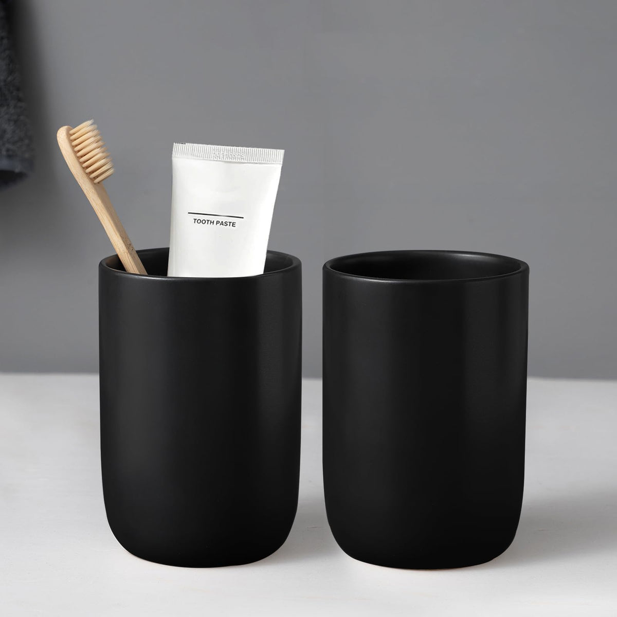 BSDISP matte black toothbrush holder with two cups, sturdy ceramic for durable bathroom organization