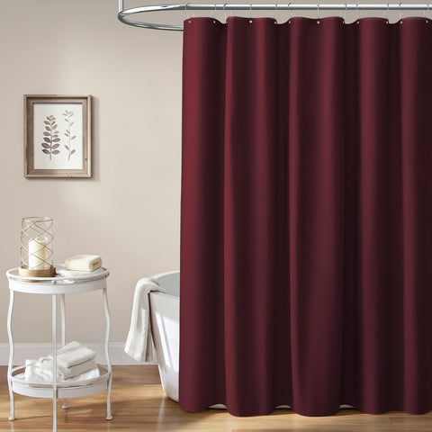 BTTN Burgundy curtain weighted hem keeps panels flat and reduces billow.
