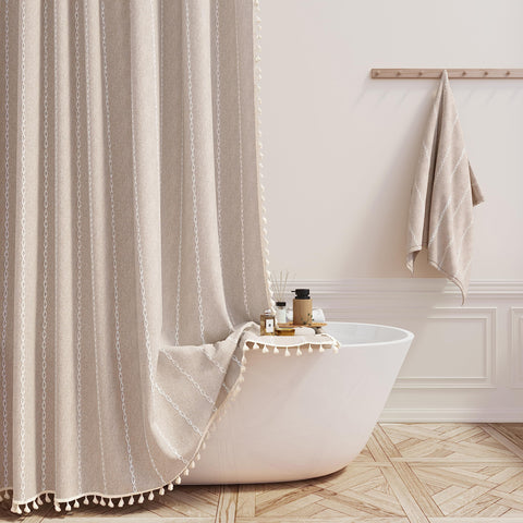 BTTN extra long shower curtain tassel stripe in tan/taupe for boho chic bathrooms.