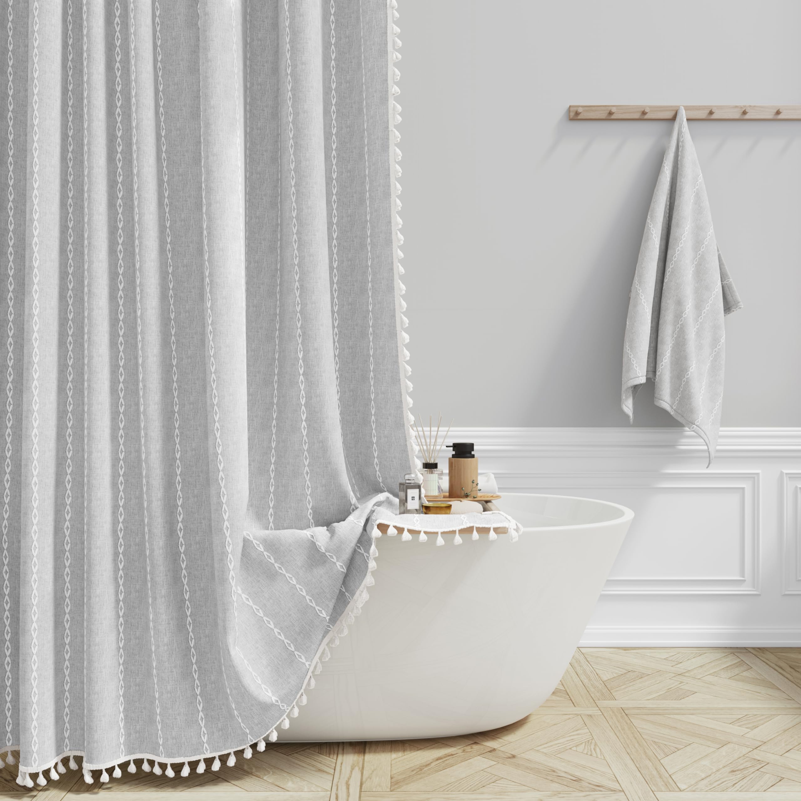 BTTN gray boho farmhouse shower curtain tassel detail enhances luxury bath ambiance.