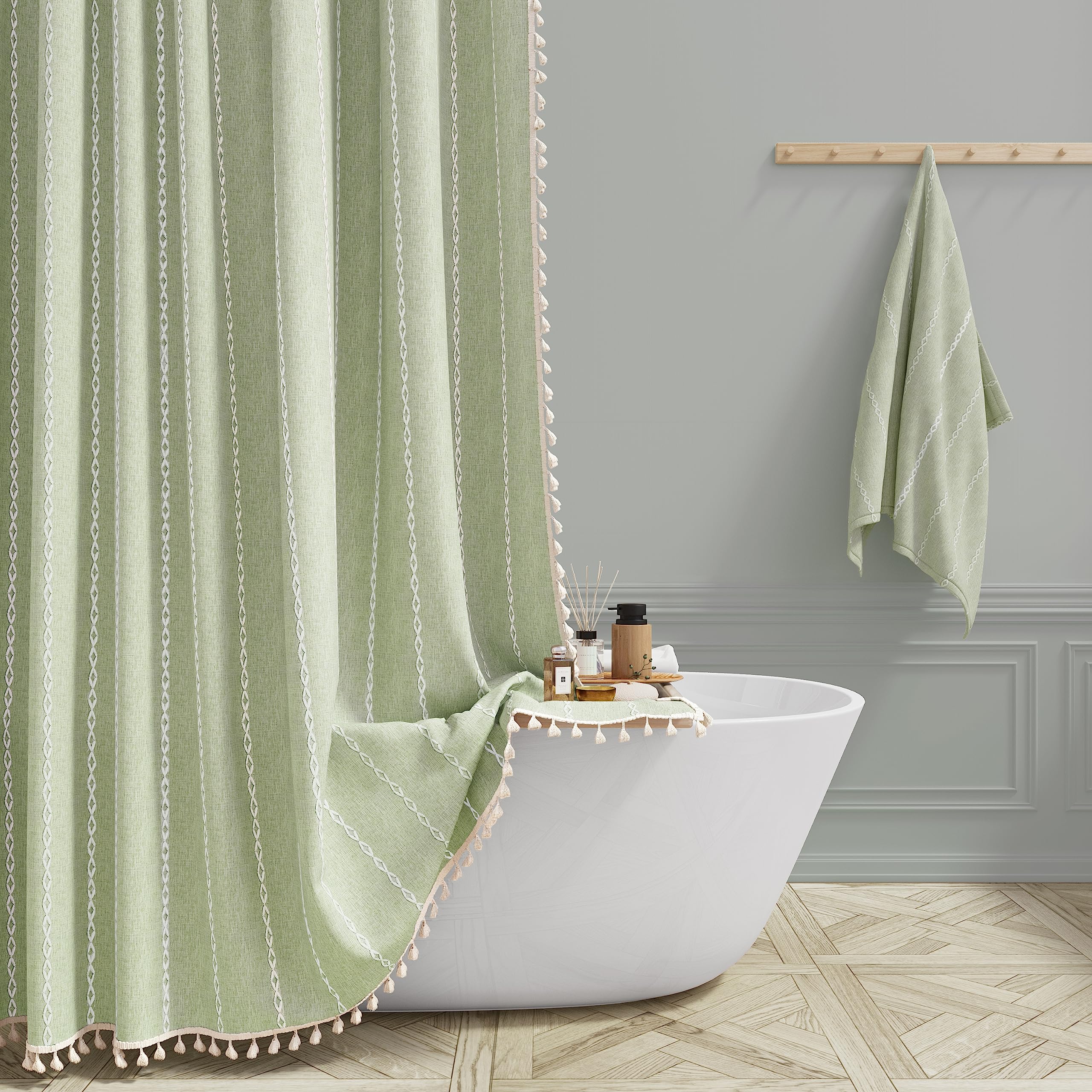 BTTN sage green farmhouse shower curtain with tassel trim enhances luxurious boho bathroom ambiance.