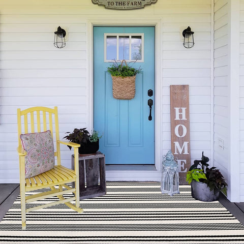 BUAGETUP farmhouse-modern decor rug complements layered mats and porch styling.