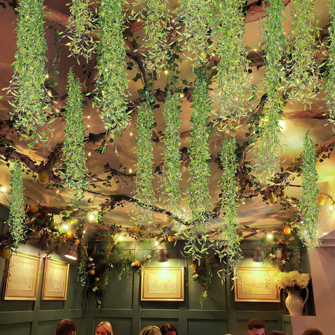 Bucherry artificial hanging vines 9.8ft rolls add depth to space.