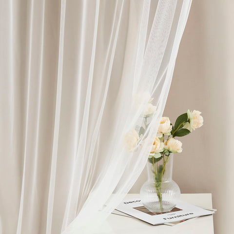 Bujasso beige blackout panels diffuse light while preserving privacy in bedrooms.