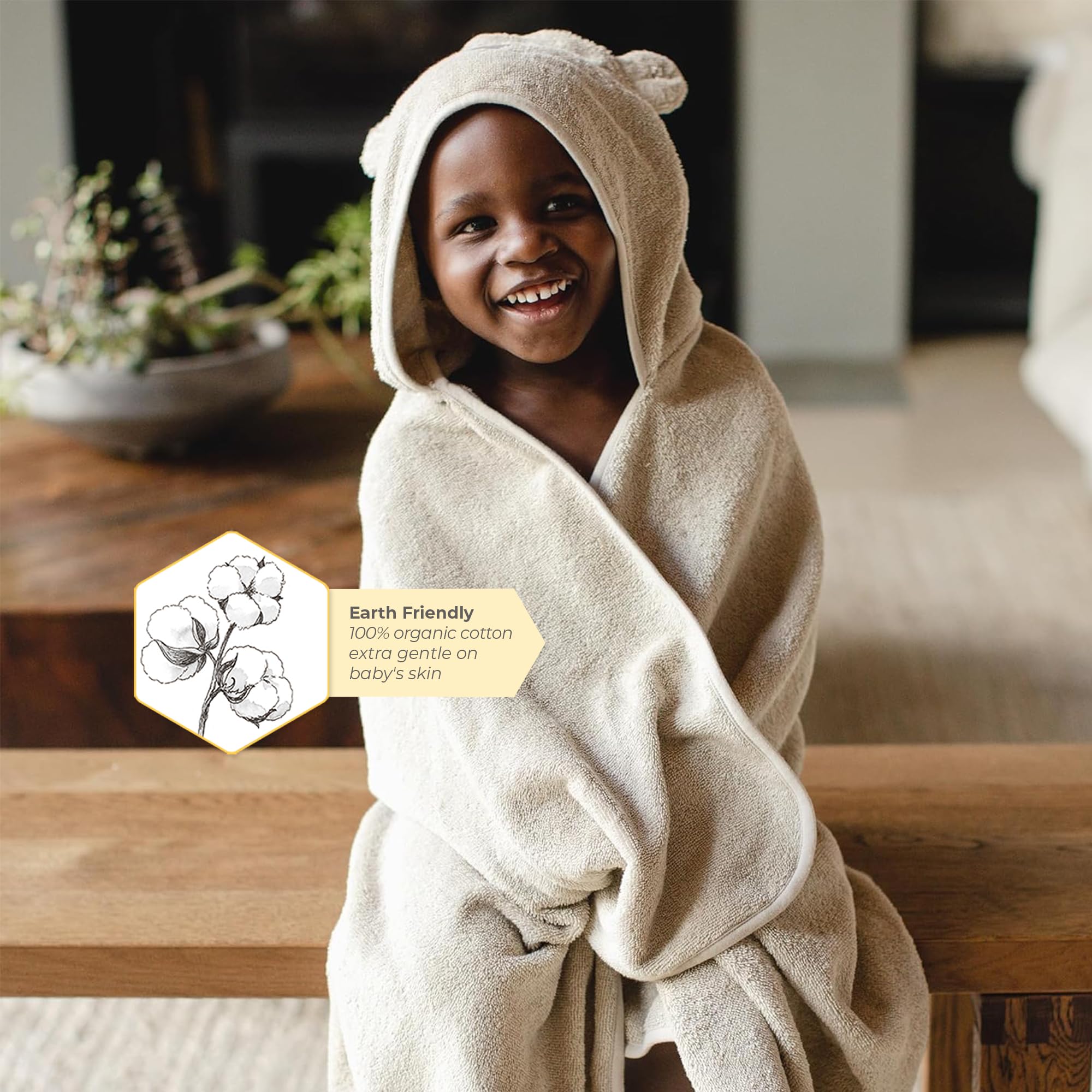 Burt's Bees Baby hooded towel 50x26 inches, ideal for wrapping after baths.