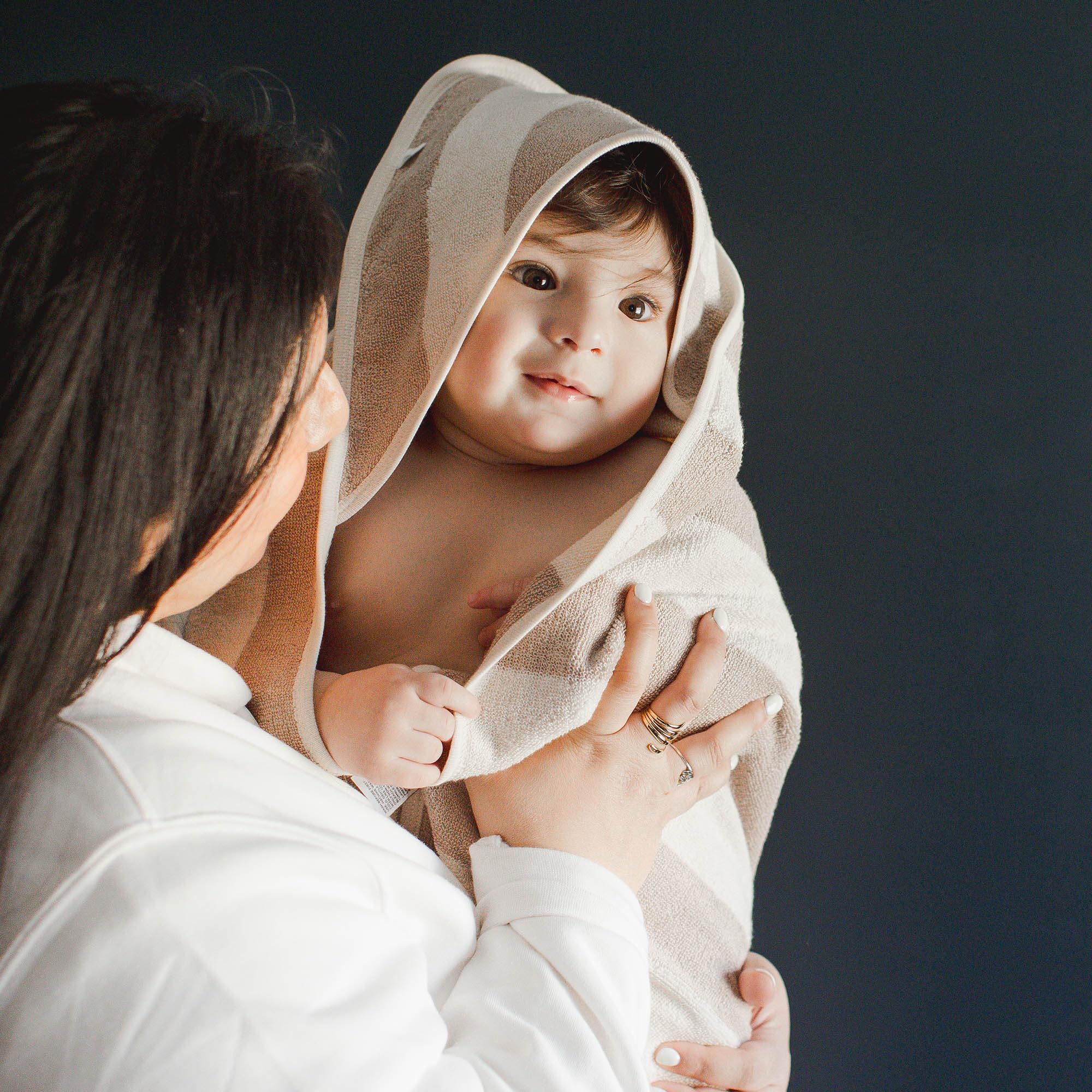 Burt's Bees Baby hooded towel smooth outside layer feels gentle after bath.