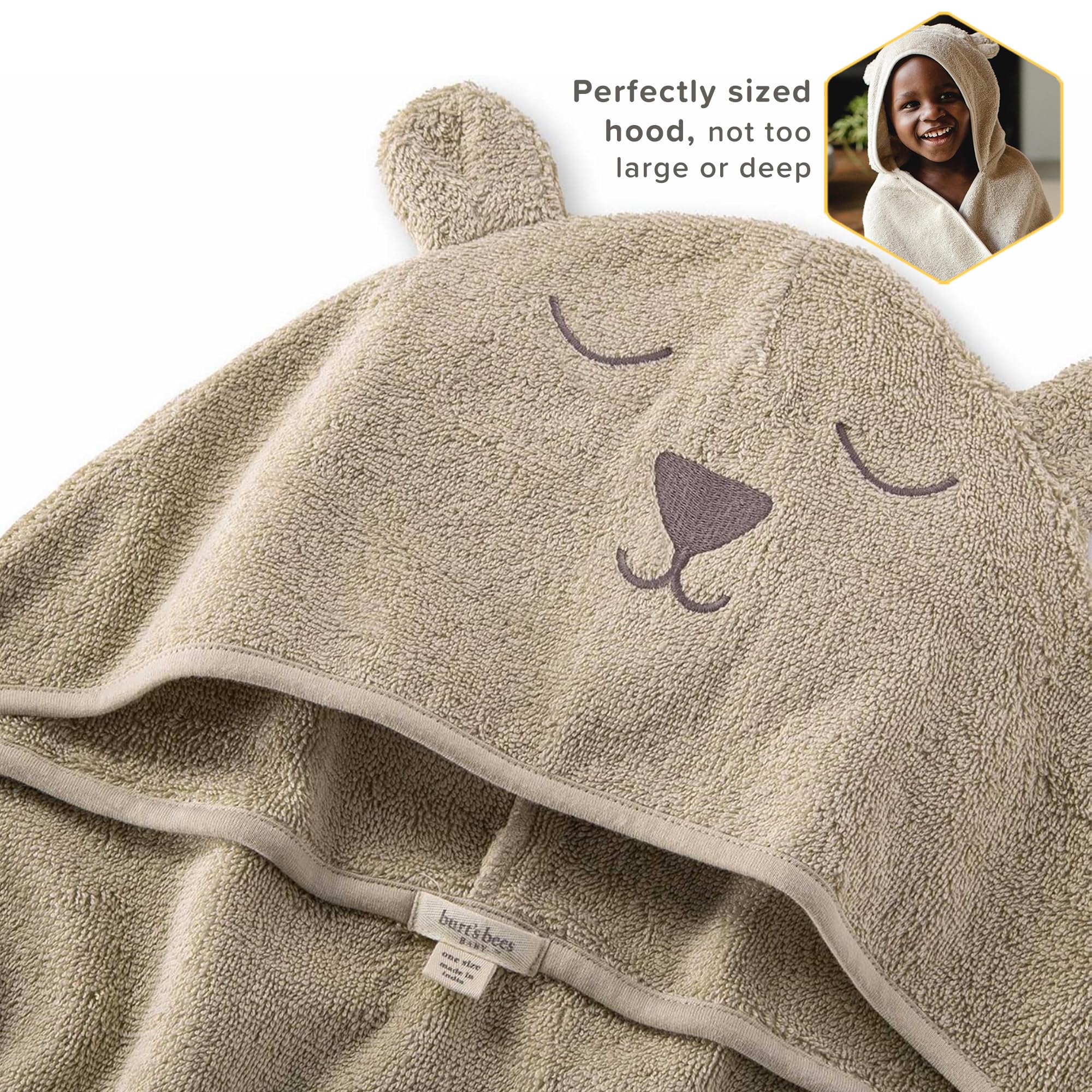 Burt's Bees Baby organic cotton towel close-up highlighting natural fibers for comfort.