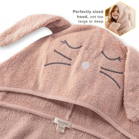 Burts Bees Baby hooded towel with bunny face adds gentle warmth after baths.