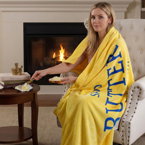 Buryeah butter blanket fabric texture close-up reveals durable polyester feel.