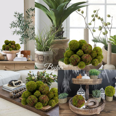 BYHER table arrangements gain depth with moss balls and natural textures.
