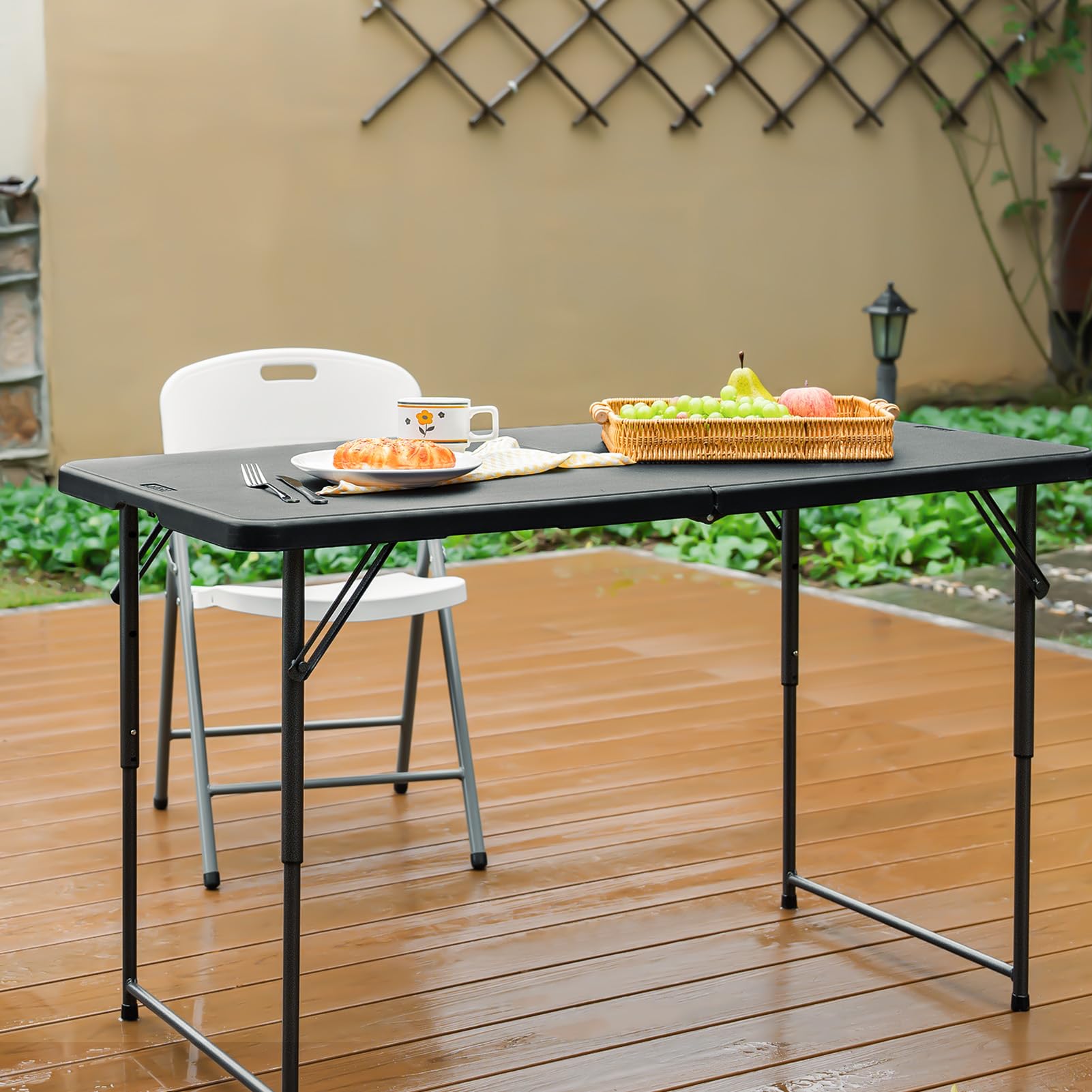 Byliable folding table carrying handle for easy transport