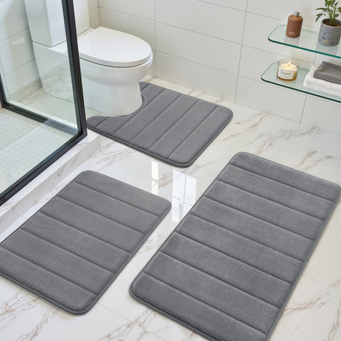 BYSURE dark grey memory foam bath mat 32x20 with anti-slip backing for secure footing.