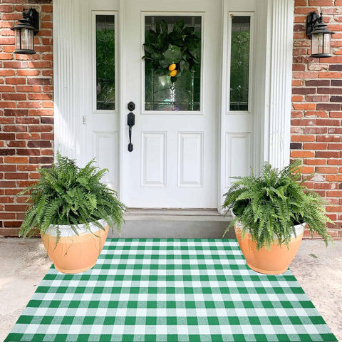 CAINANEL Buffalo Plaid Outdoor Rug complements decks and patios with seasonal decor.