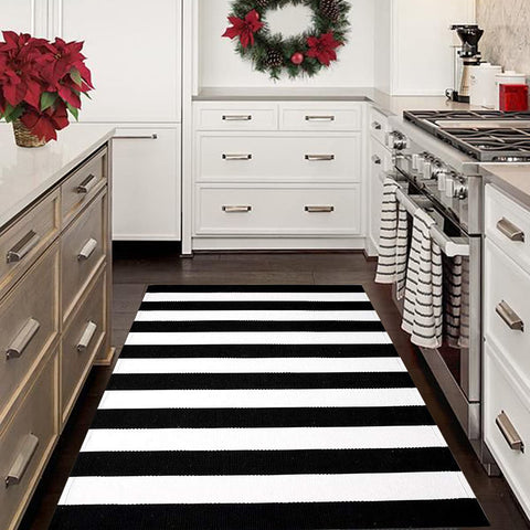 CAINANEL indoor-outdoor rug in entryway adds farmhouse style.