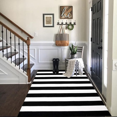 CAINANEL machine washable rug for easy cleaning and maintenance.