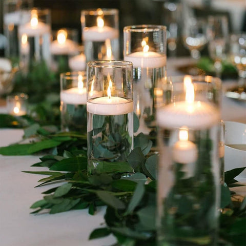 CAKETYCG 3-inch white floating candles ideal for elegant tabletop displays.
