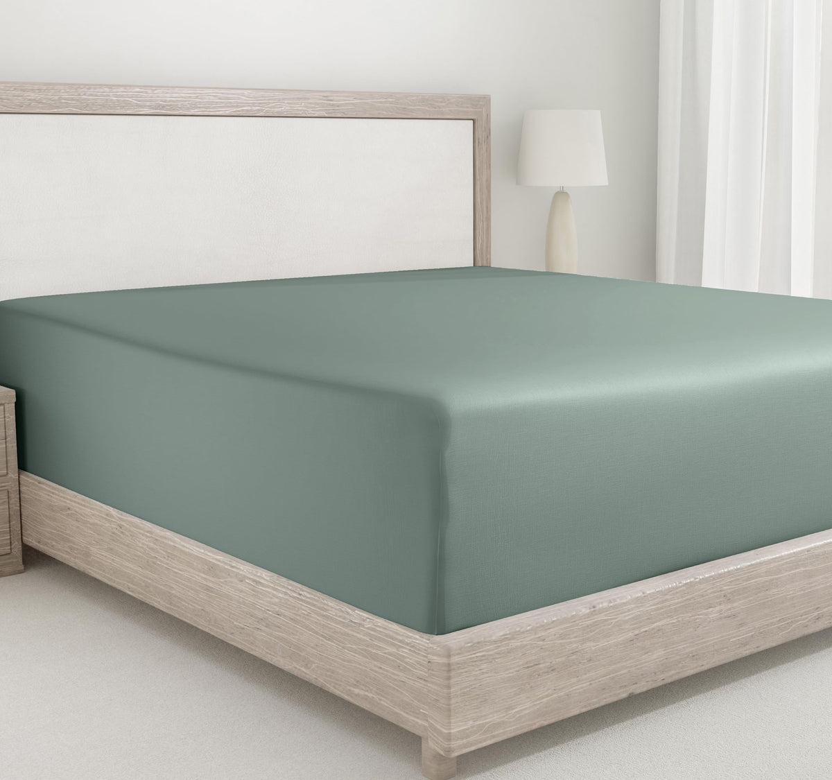 California Design Den deep fitted queen sheet in sage green offers secure, snug bed fit.