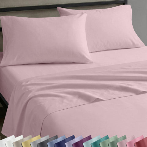 California Design Den pink full-size sheet set on bed with silky sateen finish for comfort