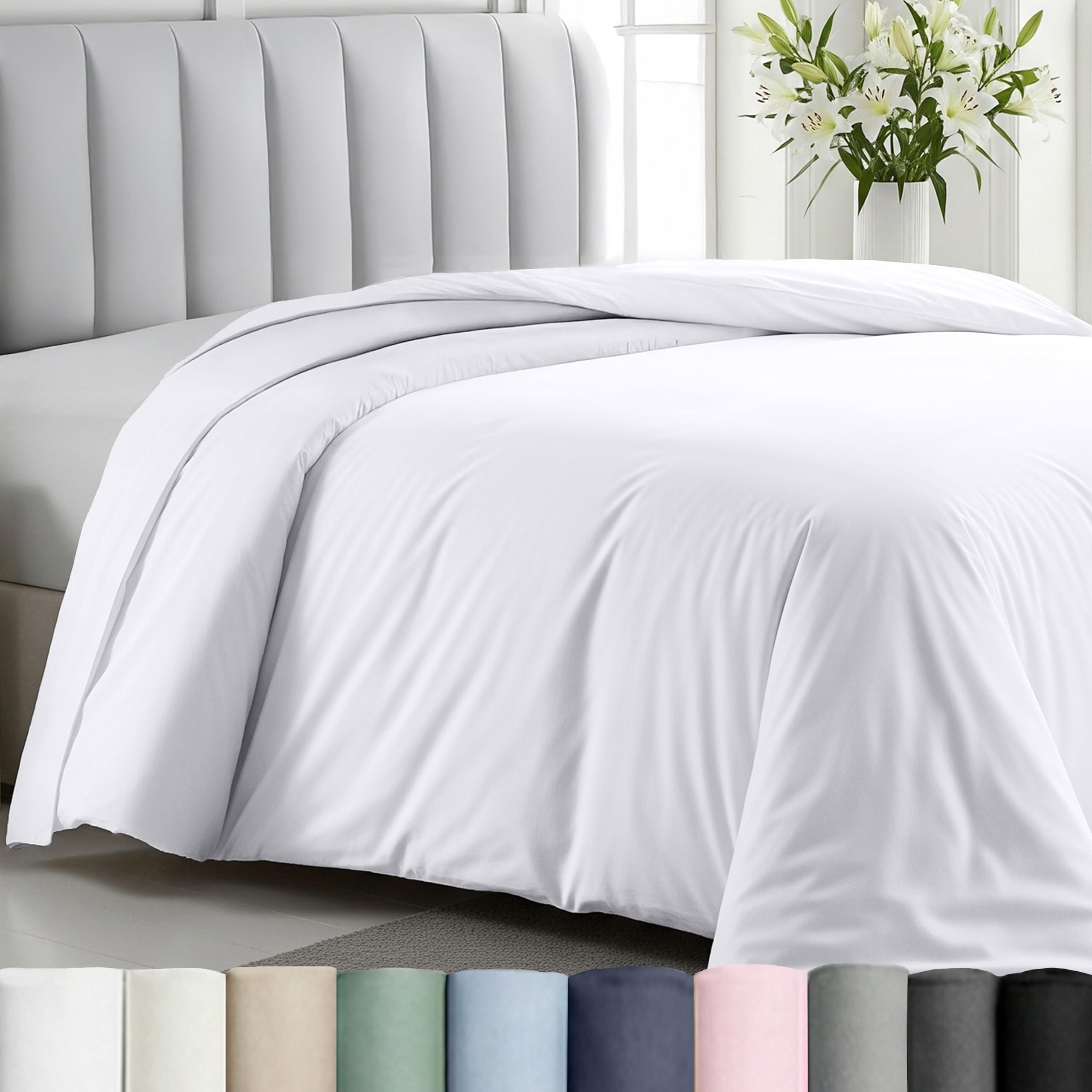 California Design Den twin XL duvet cover white satin close-up showing silky texture.