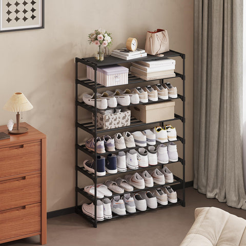 Calmootey top shelf holds lightweight items like bags and umbrellas.