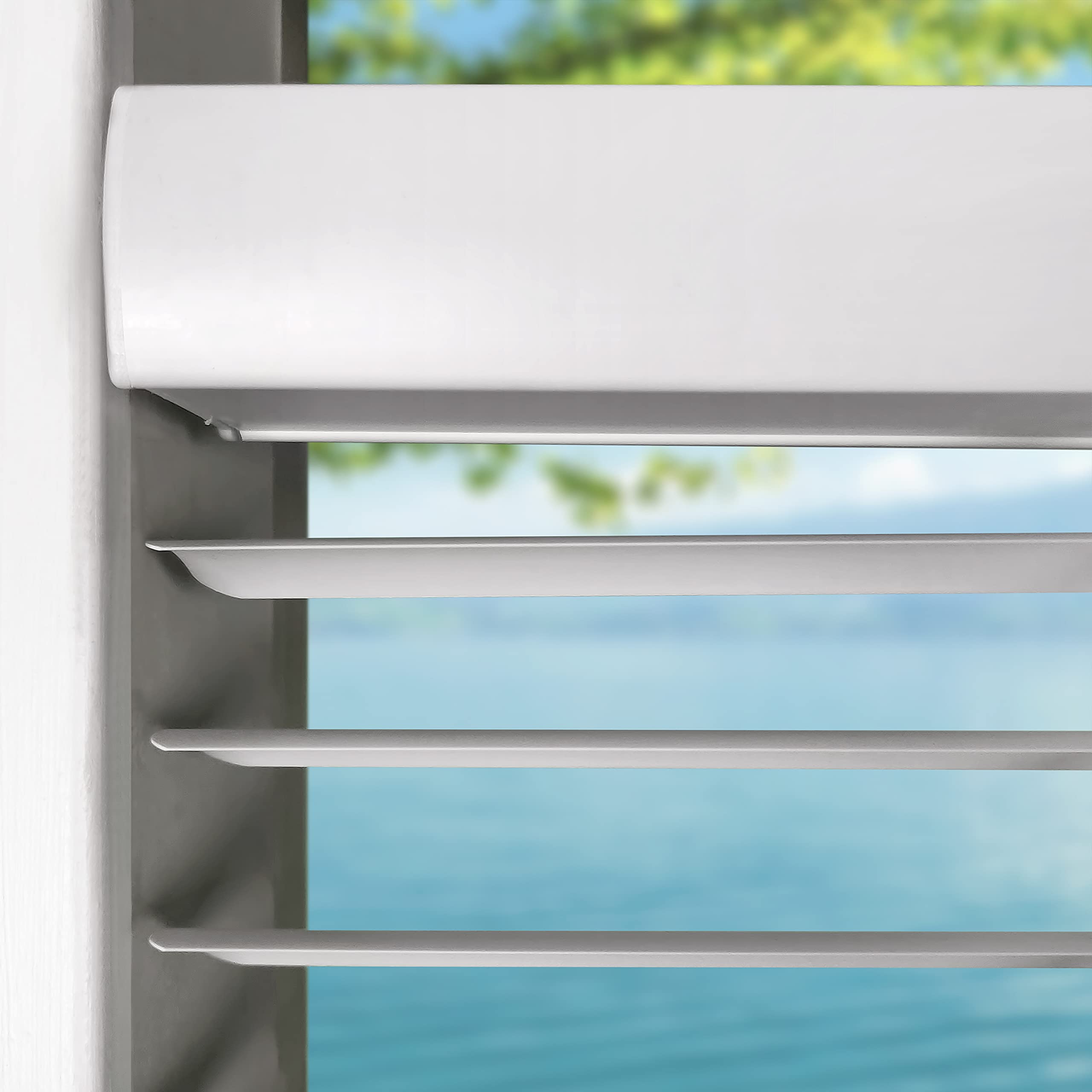 Calyx Interiors vinyl mini blind moisture-resistant for bathrooms or basements with easy cleaning.