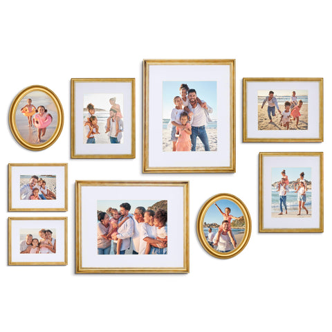 Camden Reed mixed gallery wall frames in brass finish ideal for a cohesive living room display.