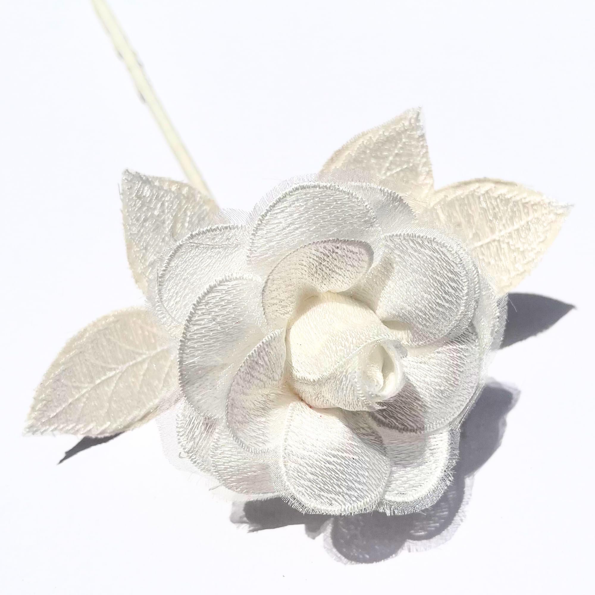 Camellia Bees lace rose close-up, a timeless 13th wedding keepsake.