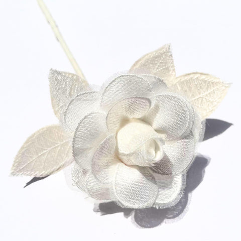 Camellia Bees lace rose close-up, a timeless 13th wedding keepsake.