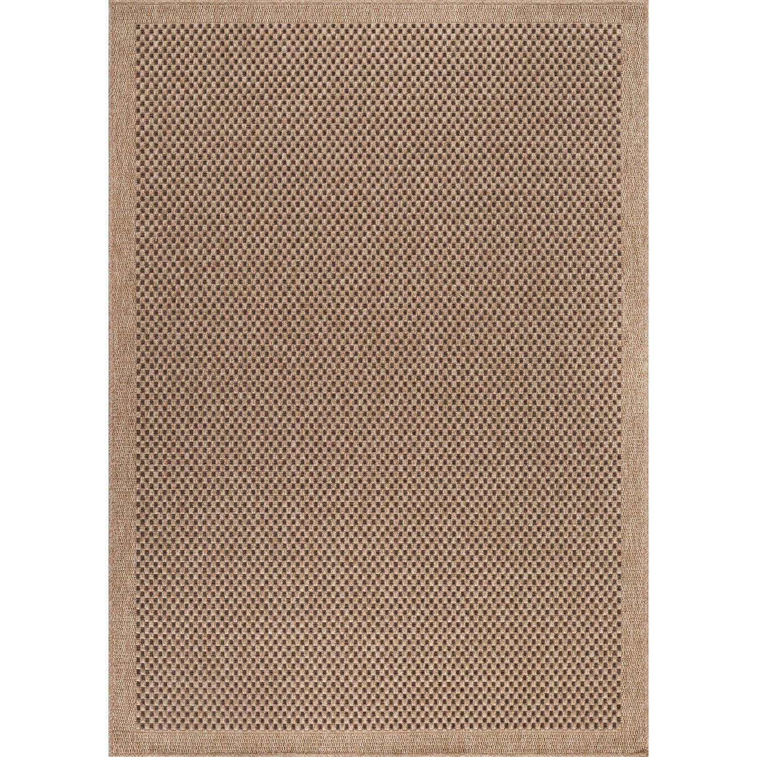 CAMILSON Easy Jute-Look Rug 6x9 on patio with resilient surface.