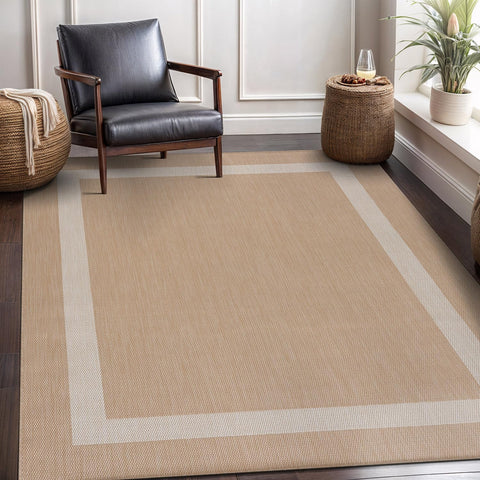 CAMILSON modern bordered rug complements beige-white décor indoors.