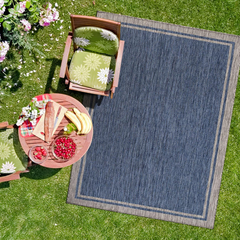 CAMILSON UV-protected rug preserves color under sun and rain.