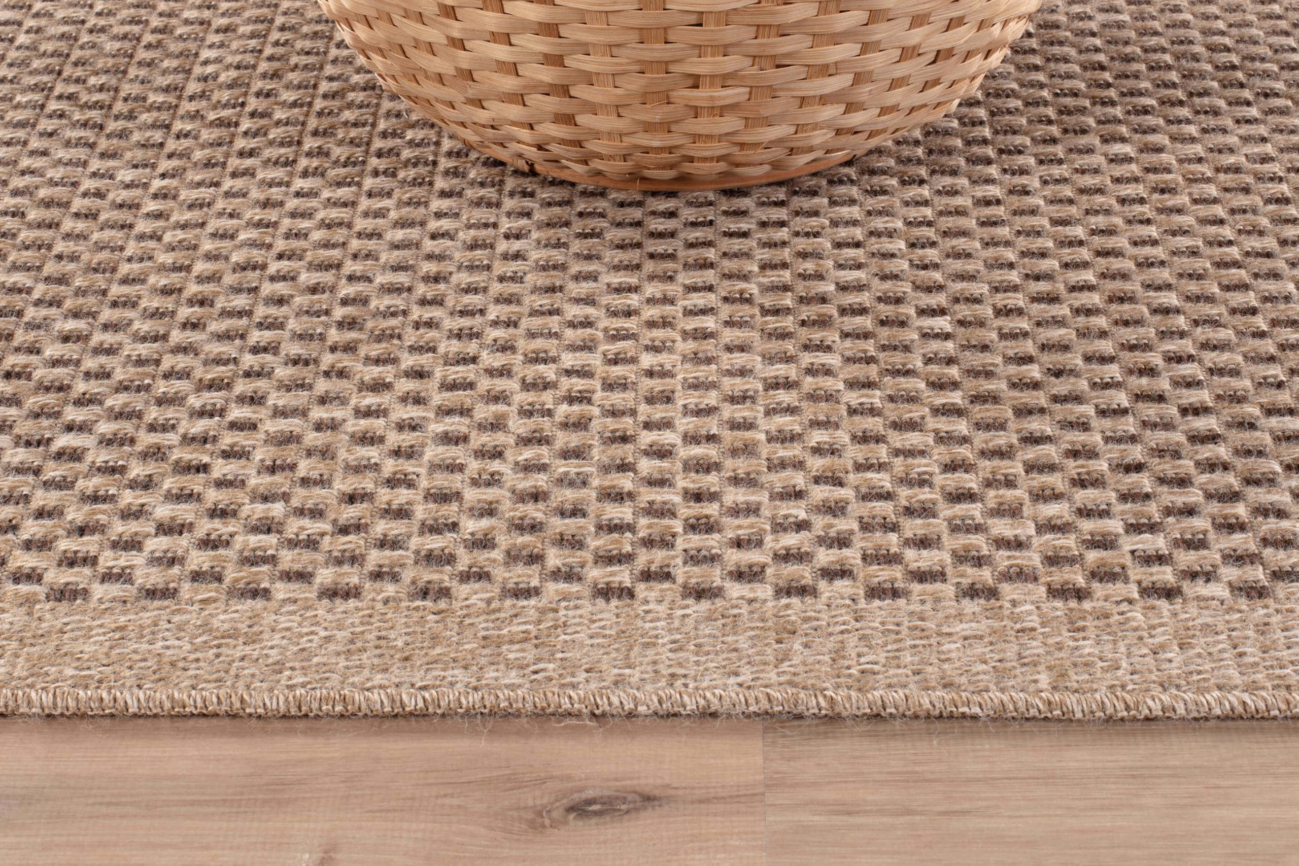 CAMILSON Sisal-inspired boho-weave rug for entryways and dining areas.